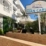 Juan Carlos *